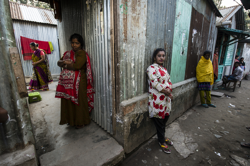 Women waiting for customers in the Kandapara brothel in Tangail.
