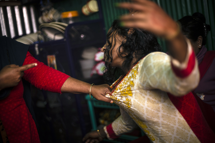 Bonna, 27, a sexworker in the Kandapara brothel in Tangail, is fighting with another woman.