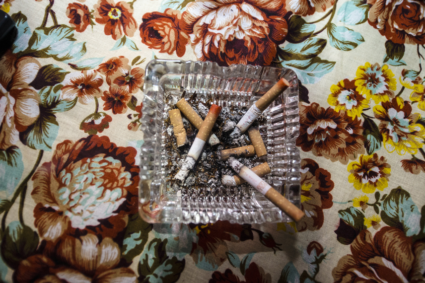 Cigarettes with lipstick of the sex workers in an ashtray.